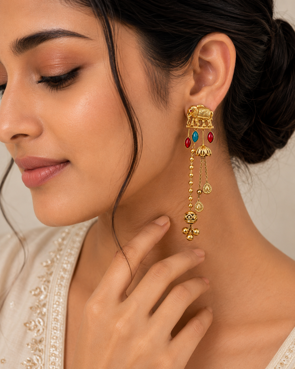 Ornate Elephant Gold Tassel Earrings